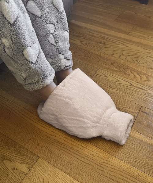 Luxury foot hot water bottle and cover in plush faux fur